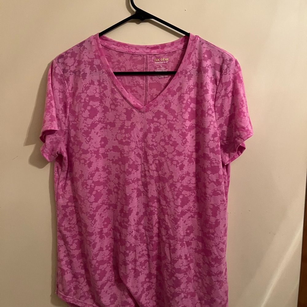 Three Tek Gear Patterned Short Sleeve shirts.